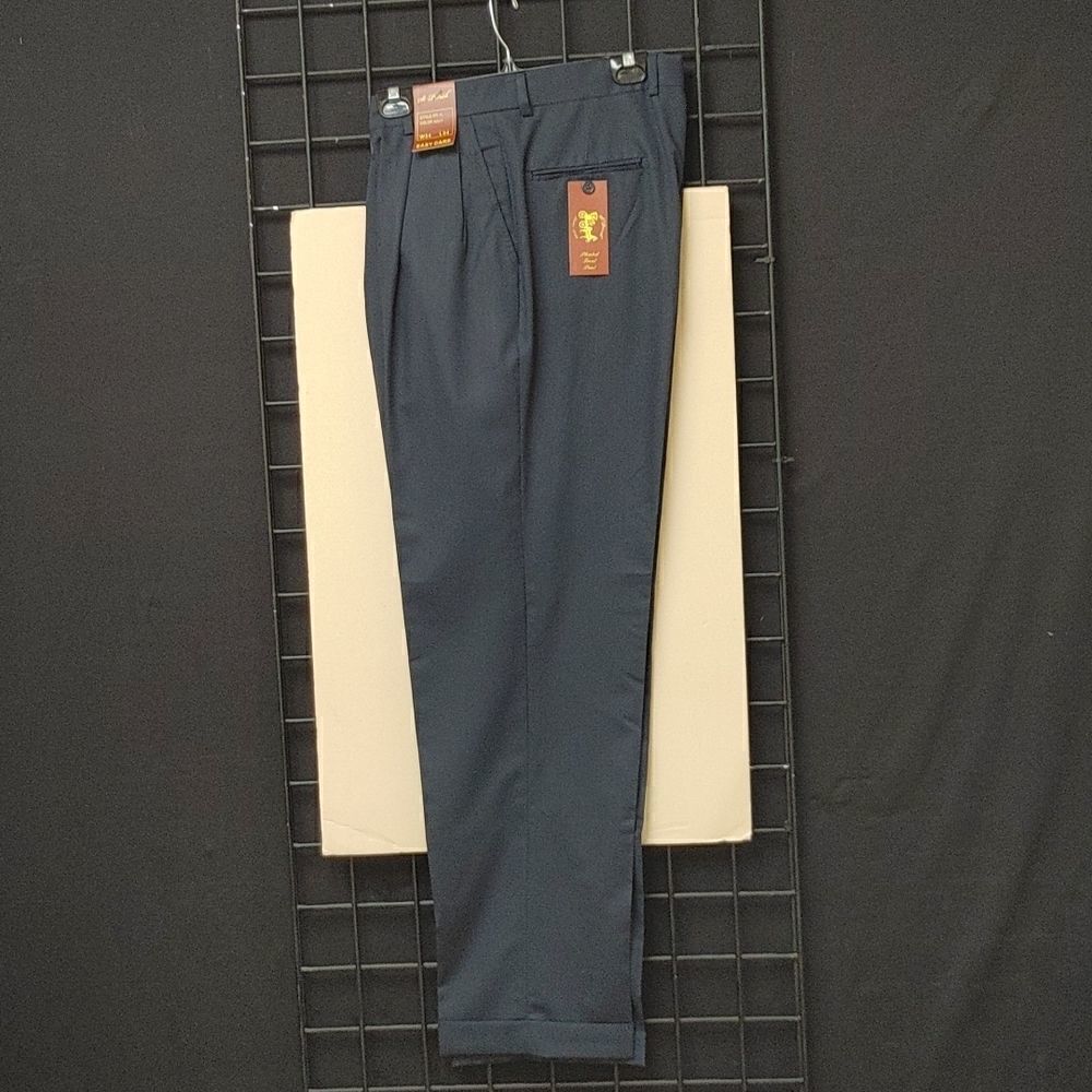 ST. PATRICK NAVY POLY/RAYON PLEATED DRESS SLACK.